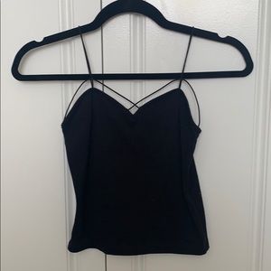 Adorable black crop top with crisscross detail